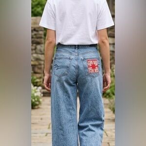 💥Blue wide leg Jeans with Red Floral Hawaiian Quilt Patch